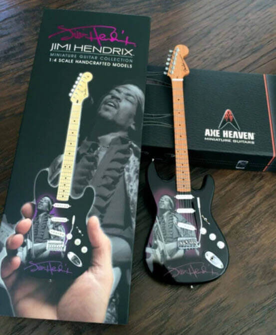 JIMI HENDRIX Guitare Miniature avec médiator Fender Sunburst